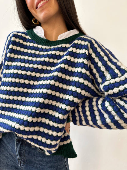 Grüner Strickpullover