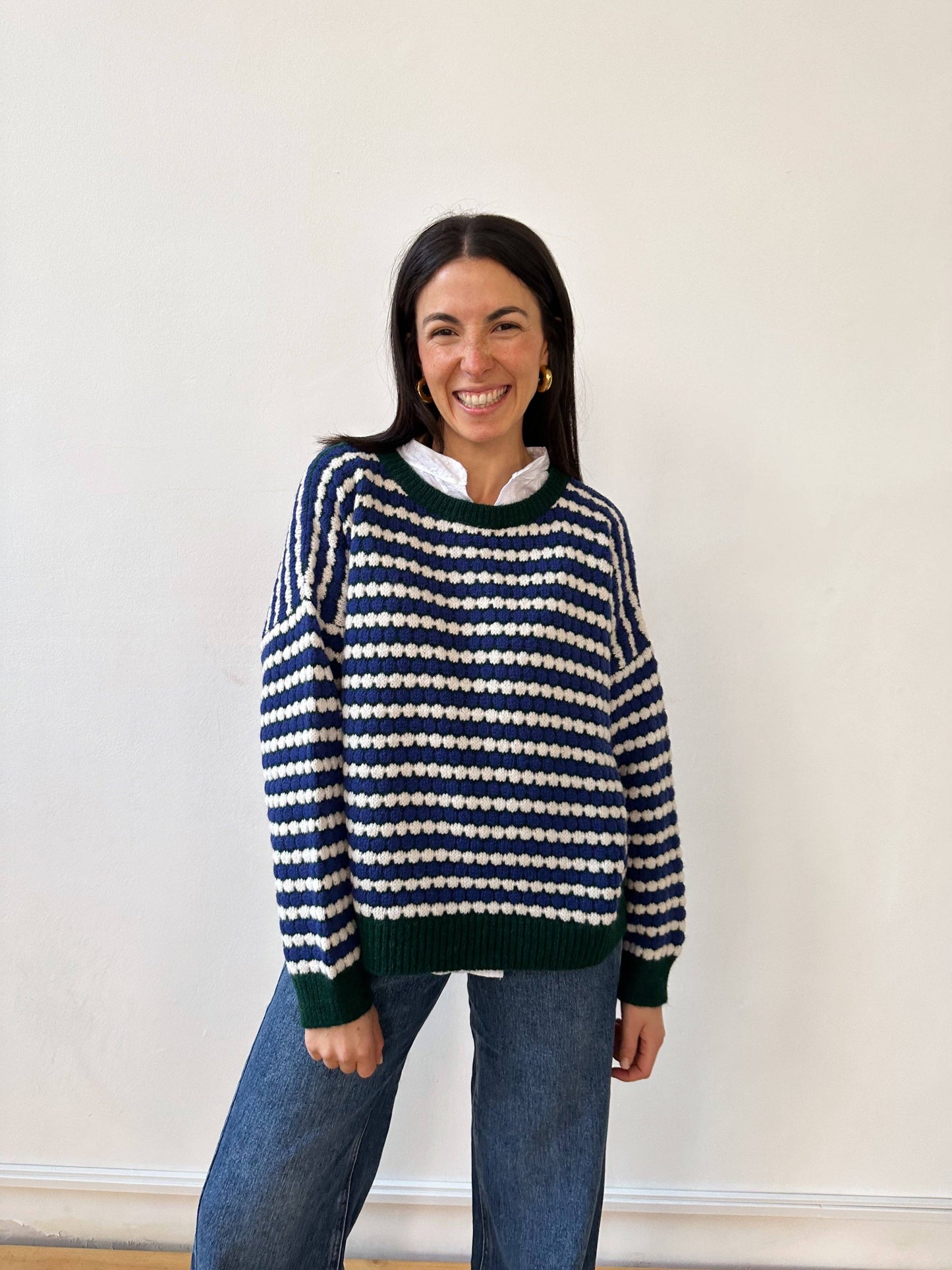 Grüner Strickpullover