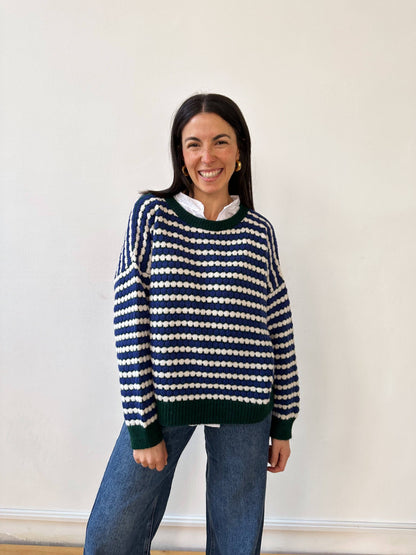 Grüner Strickpullover